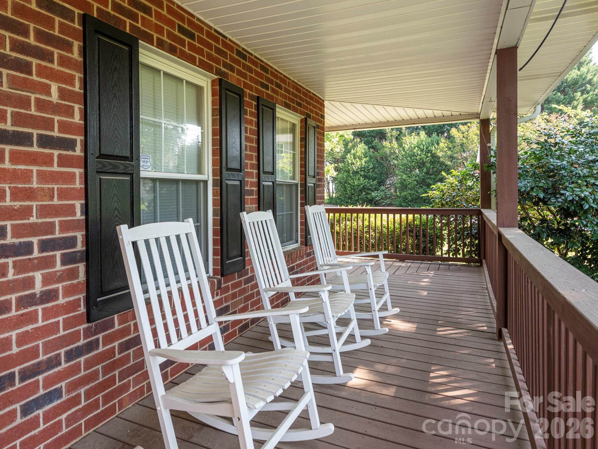 4440 Hucks Road Charlotte, NC 28269 - Photo 38 of 45 a view of a chairs and table on the deck