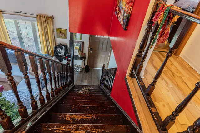 a kitchen with stainless steel appliances a stove refrigerator sink and cabinets