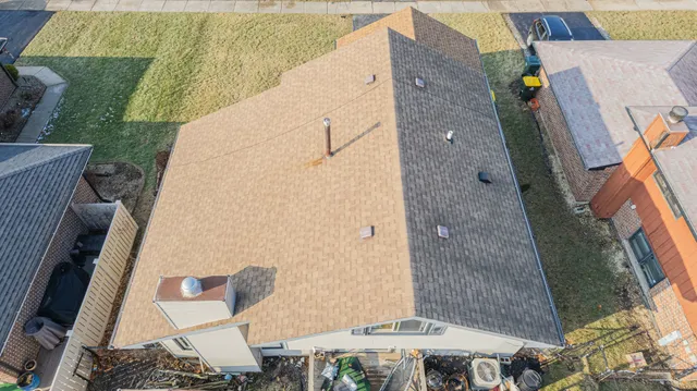 a view of a back yard of the house