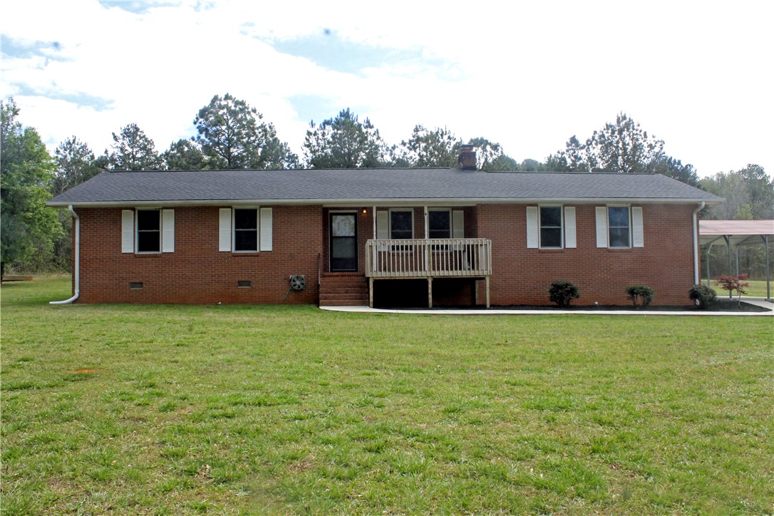 This classic brick residence offers comfort and a welcoming atmosphere.