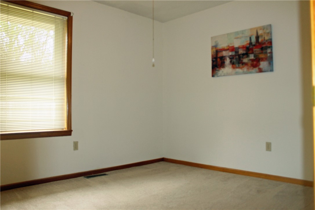 1007 O Neal Street Belton, SC 29627 - Photo 13 of 25 This versatile room offers ample natural light and a neutral canvas for your personal style.