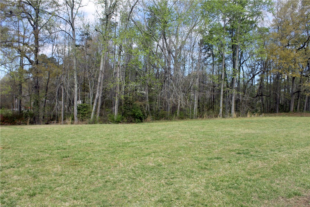 1007 O Neal Street Belton, SC 29627 - Photo 3 of 25 This lot offers a prime opportunity to create a custom residence amidst serene natural surroundings.