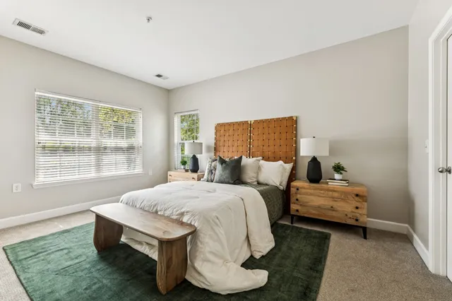 a room with a bed and a window