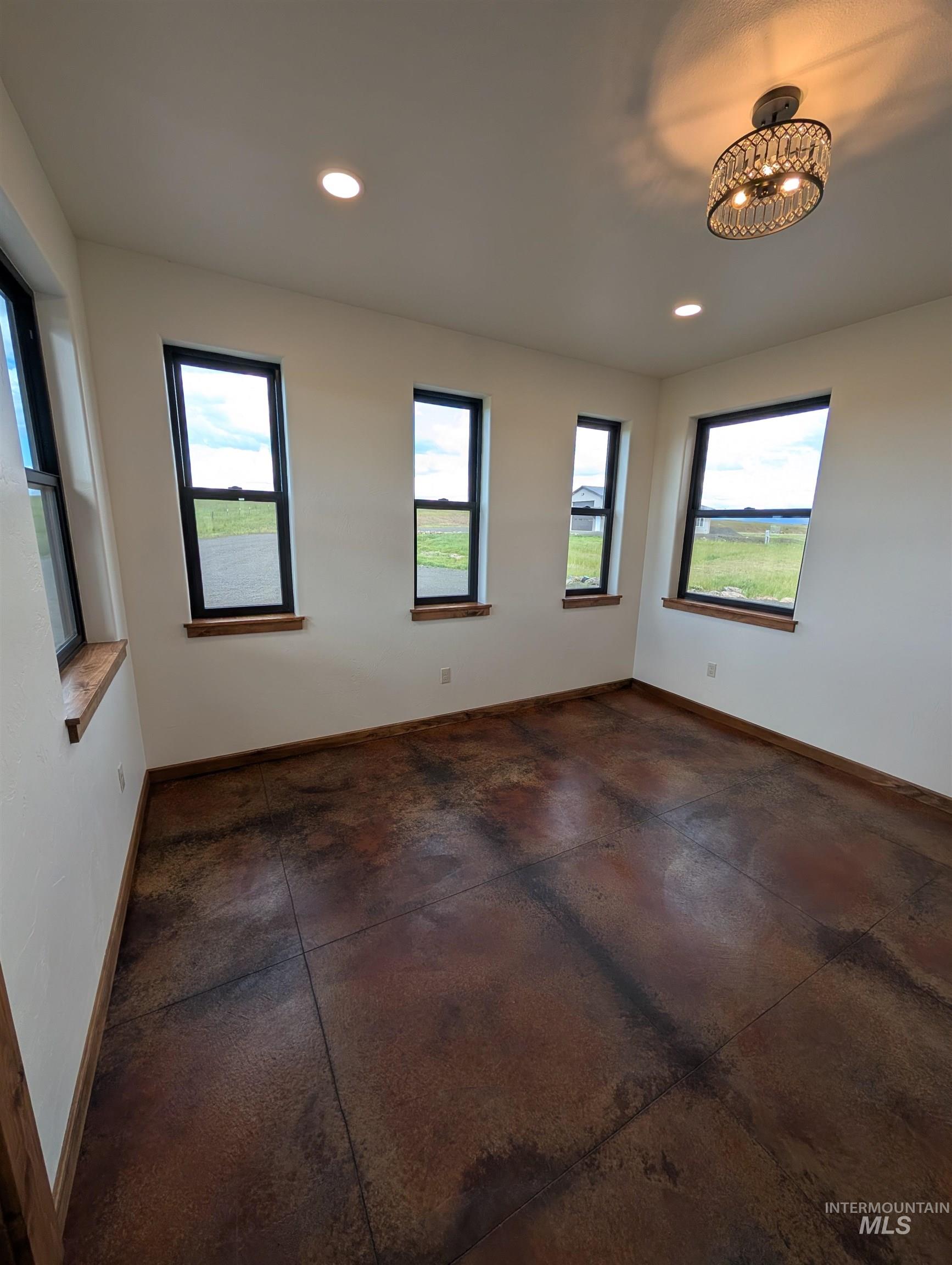 137 Angus Ranch Grangeville, ID 83530 - Photo 5 of 49 Spare room featuring baseboards and recessed lighting