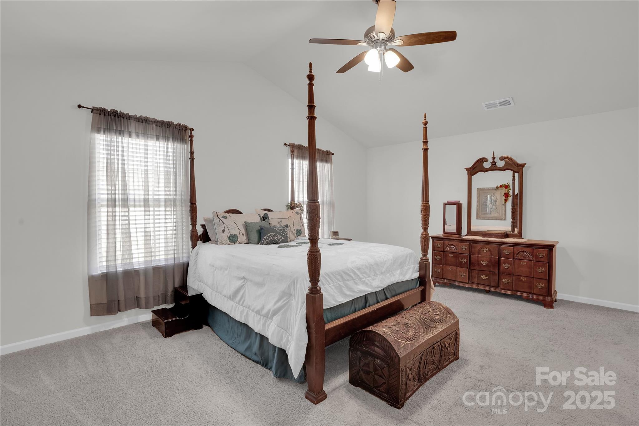 4918 Traynor Road Charlotte, NC 28216 - Photo 12 of 27 a bedroom with bed and window