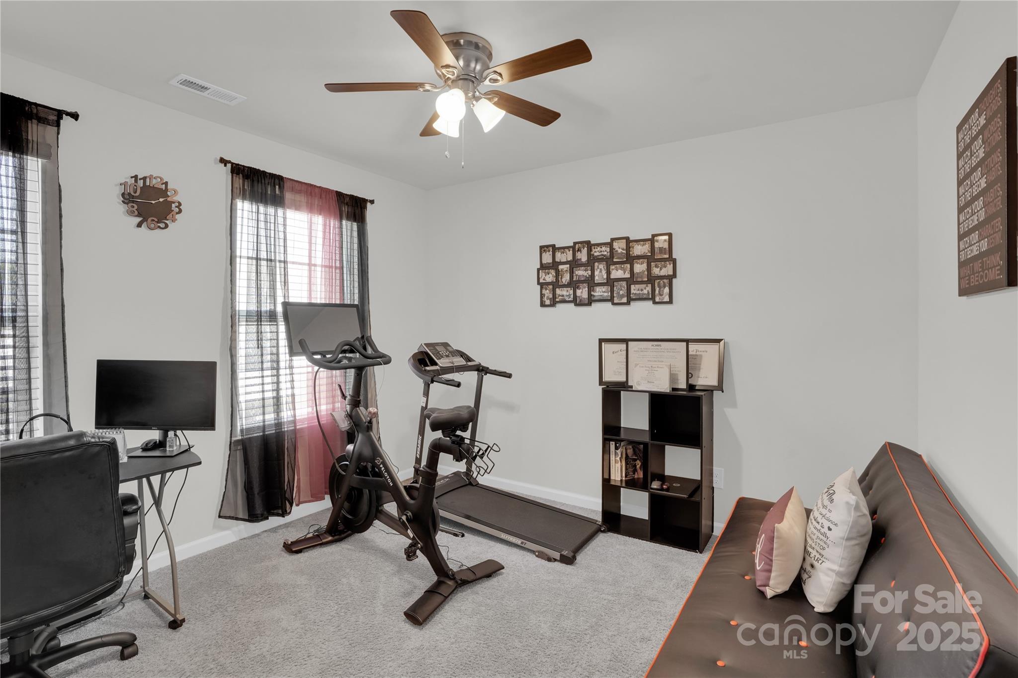 4918 Traynor Road Charlotte, NC 28216 - Photo 15 of 27 a view of a workspace with furniture and a window