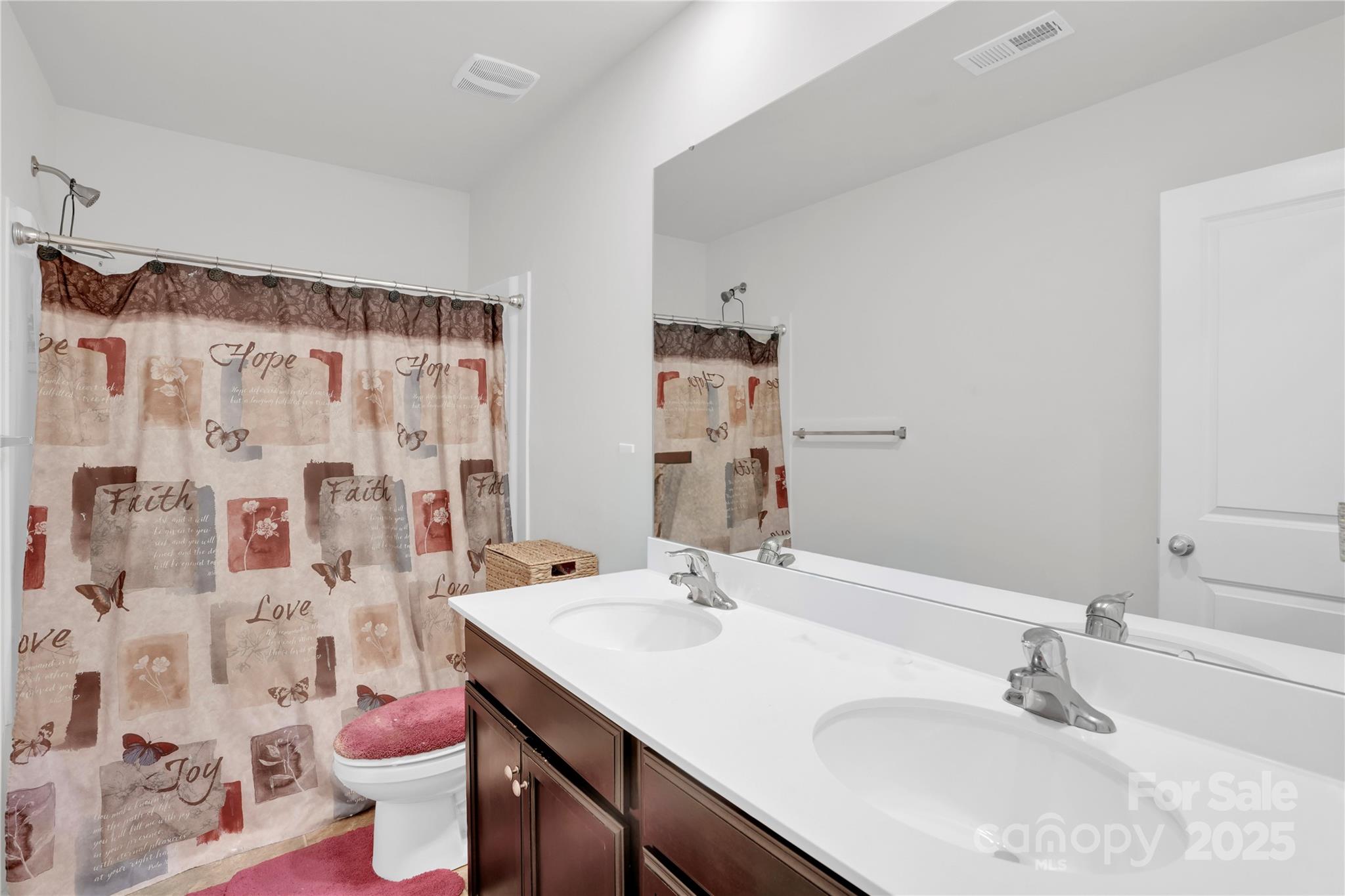 4918 Traynor Road Charlotte, NC 28216 - Photo 19 of 27 a bathroom with a sink toilet and shower