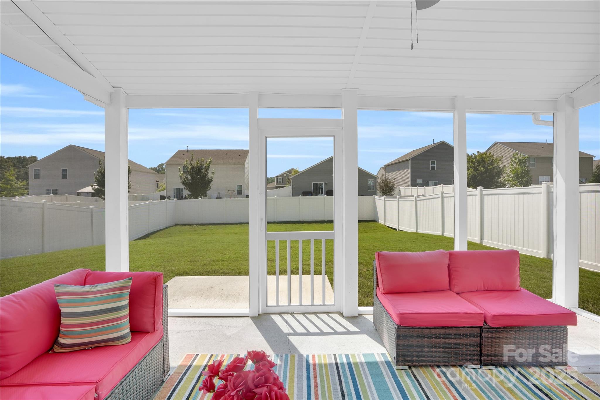4918 Traynor Road Charlotte, NC 28216 - Photo 21 of 27 a bedroom with furniture and a garden