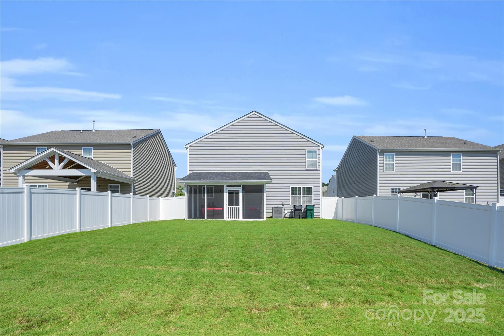 4918 Traynor Road Charlotte, NC 28216 - Photo 25 of 27 a view of a house with a backyard