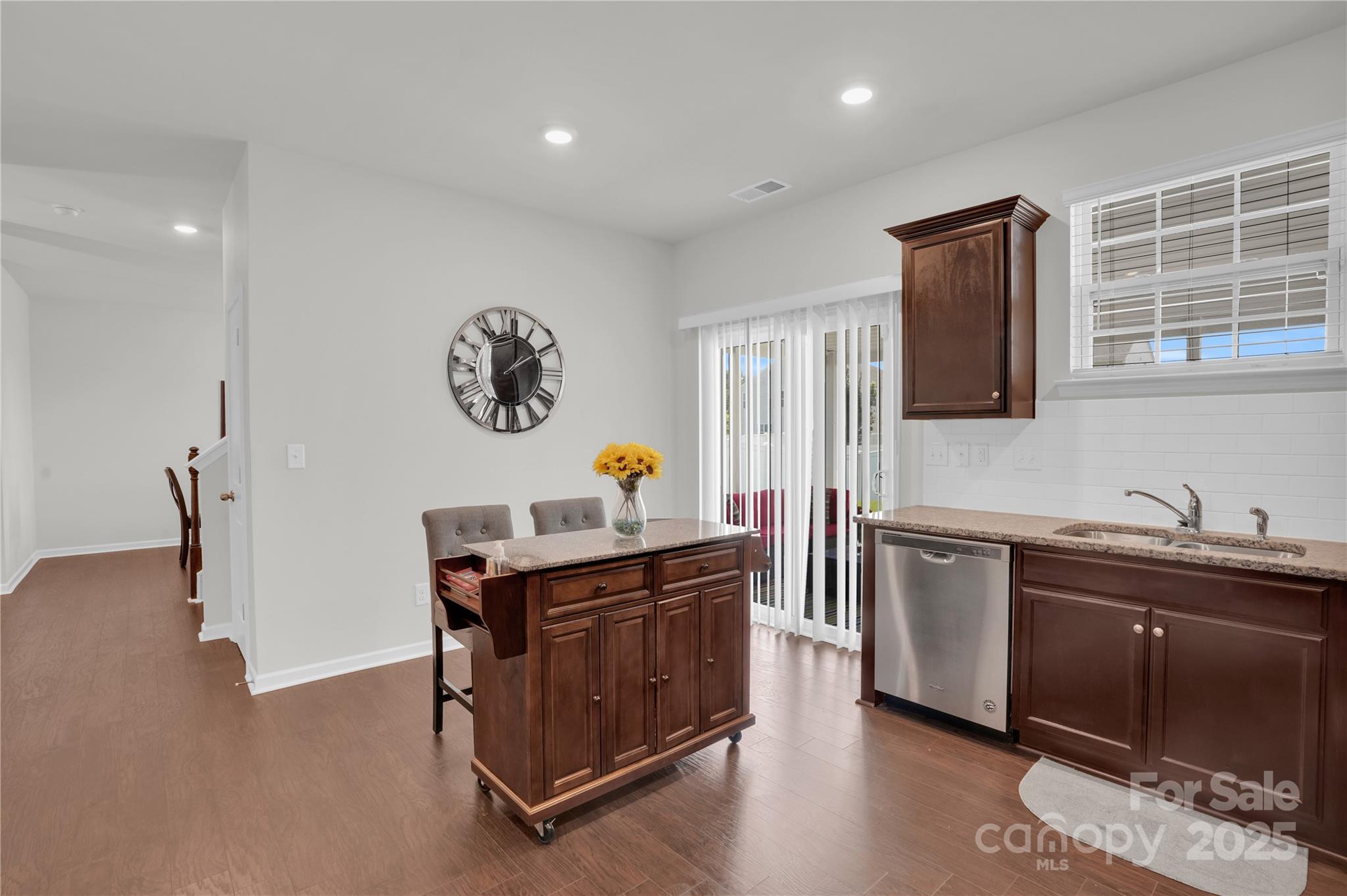 4918 Traynor Road Charlotte, NC 28216 - Photo 8 of 27 a kitchen with stainless steel appliances granite countertop a sink stove and refrigerator