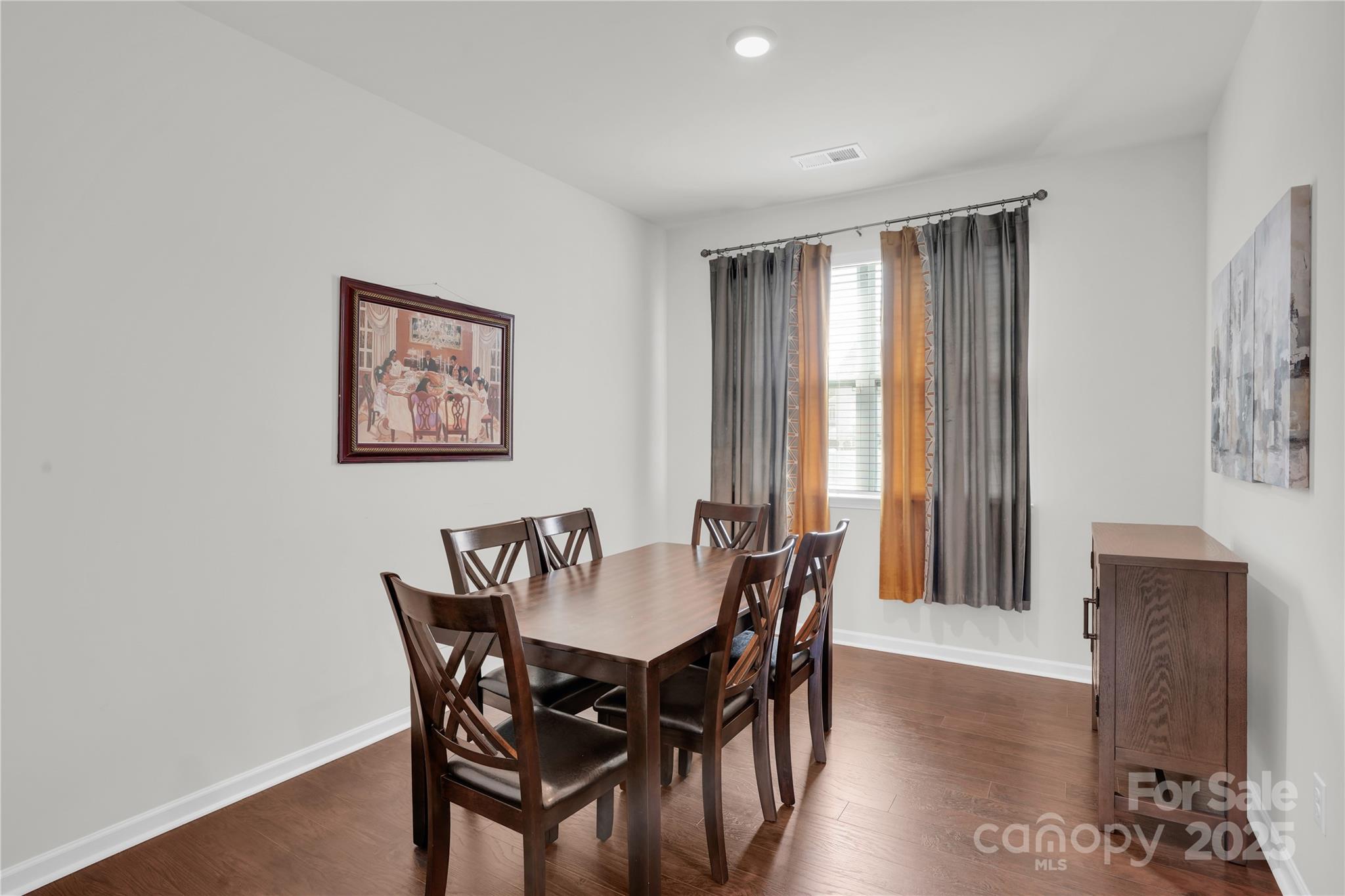 4918 Traynor Road Charlotte, NC 28216 - Photo 10 of 27 a view of a dining room with furniture and window
