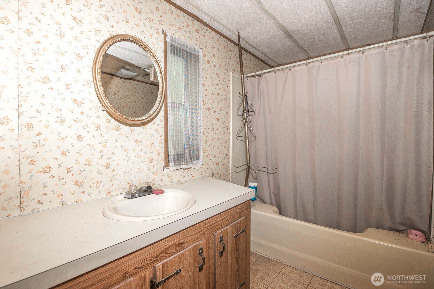 20115 49th Drive Southeast Bothell, WA 98012 - Photo 24 of 35 a bathroom with a sink and a mirror