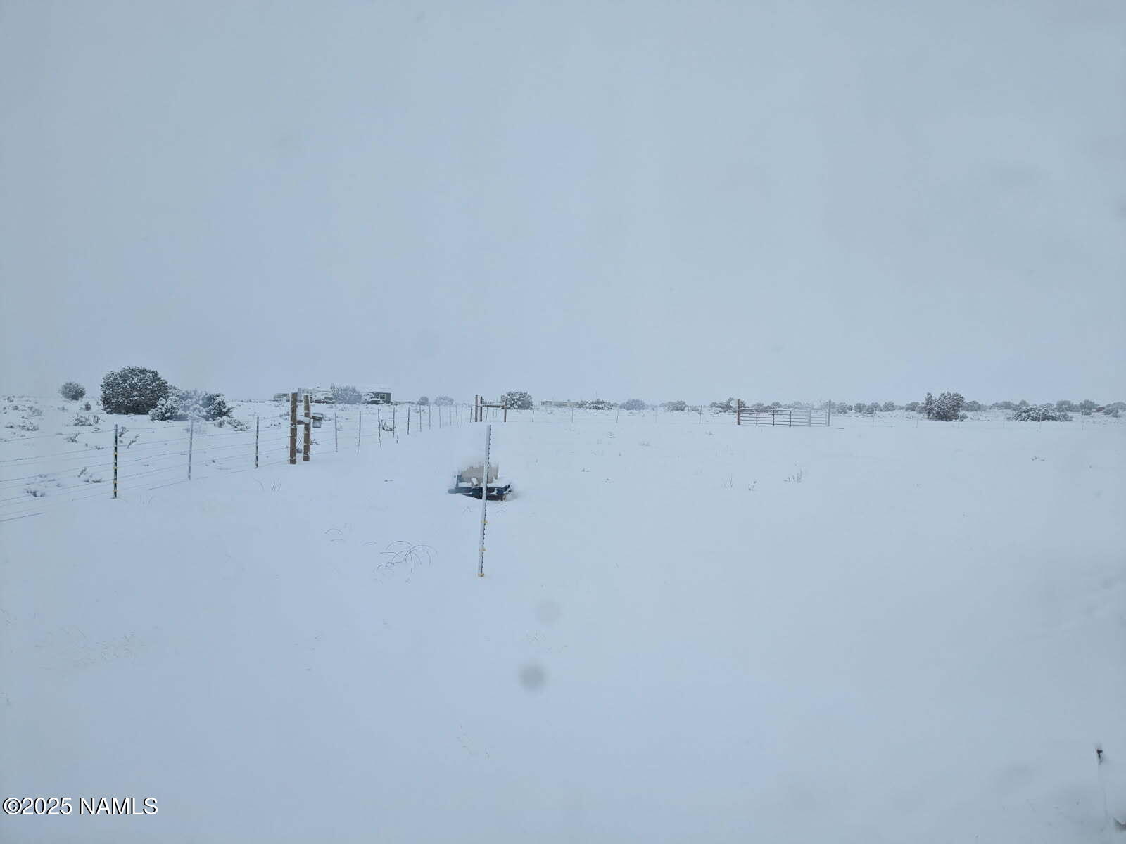 2447 Wingfield Road Williams, AZ 86046 - Photo 7 of 14 a view of a room with racks on the wall