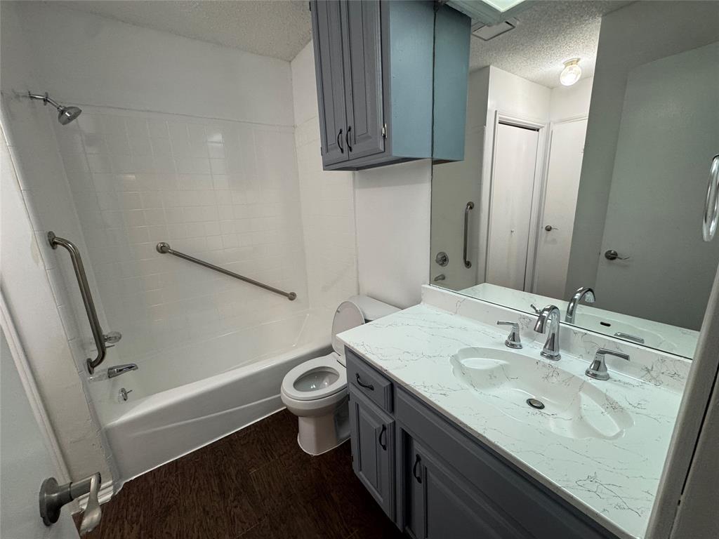 6259 Canyon Circle Fort Worth, TX 76133 - Photo 15 of 22 a bathroom with a sink and a mirror