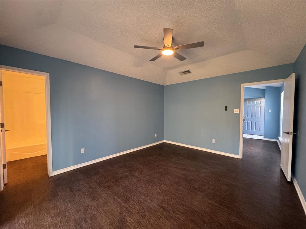 6259 Canyon Circle Fort Worth, TX 76133 - Photo 19 of 22 wooden floor in an empty room with a window