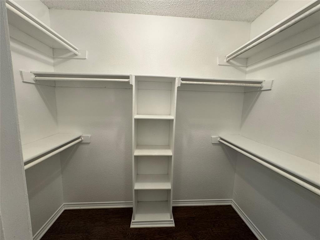 6259 Canyon Circle Fort Worth, TX 76133 - Photo 22 of 22 a view of an empty walk in closet