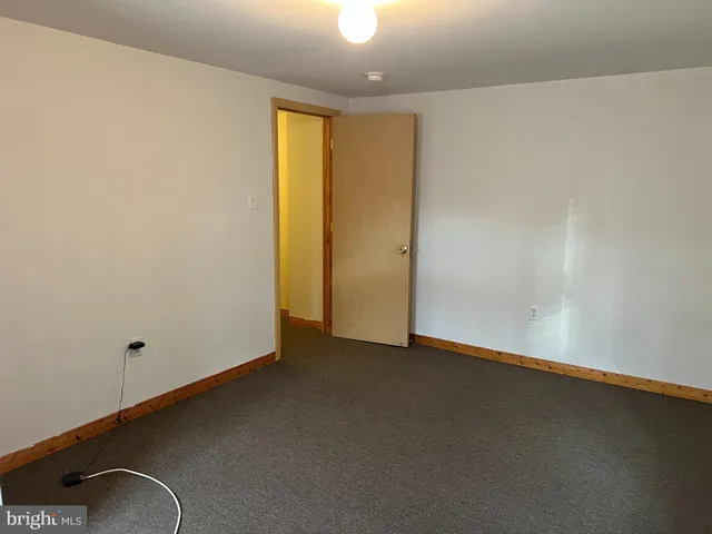 an empty room with a door
