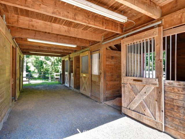a view of a room with wooden walls