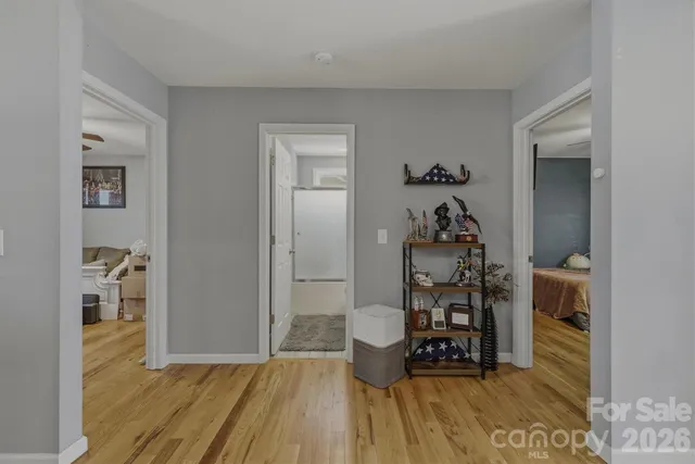 a room with furniture and wooden floor