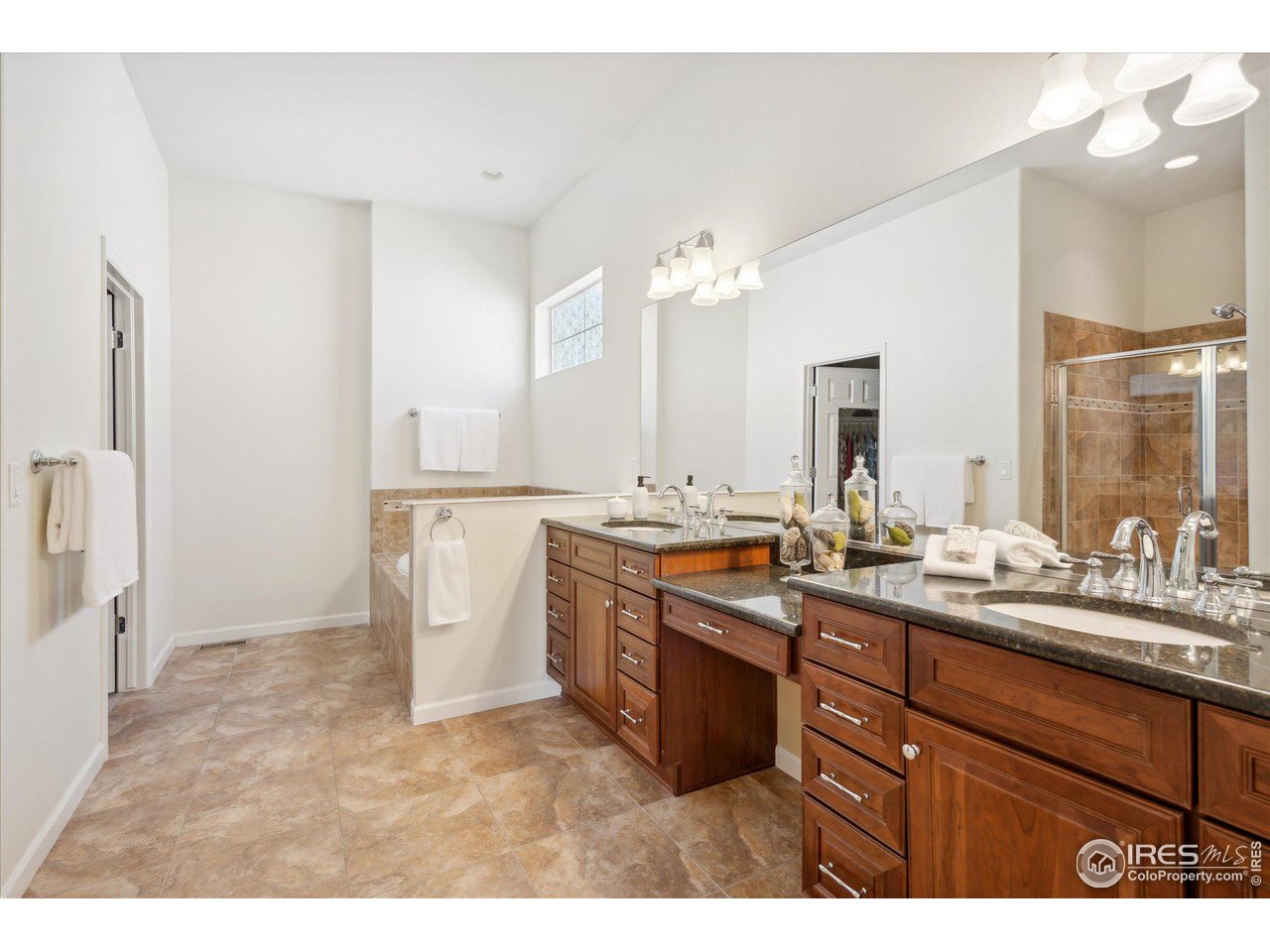 4514 Silver Mountain Loop Broomfield, CO 80023 - Photo 15 of 39 a bathroom with a sink and a mirror