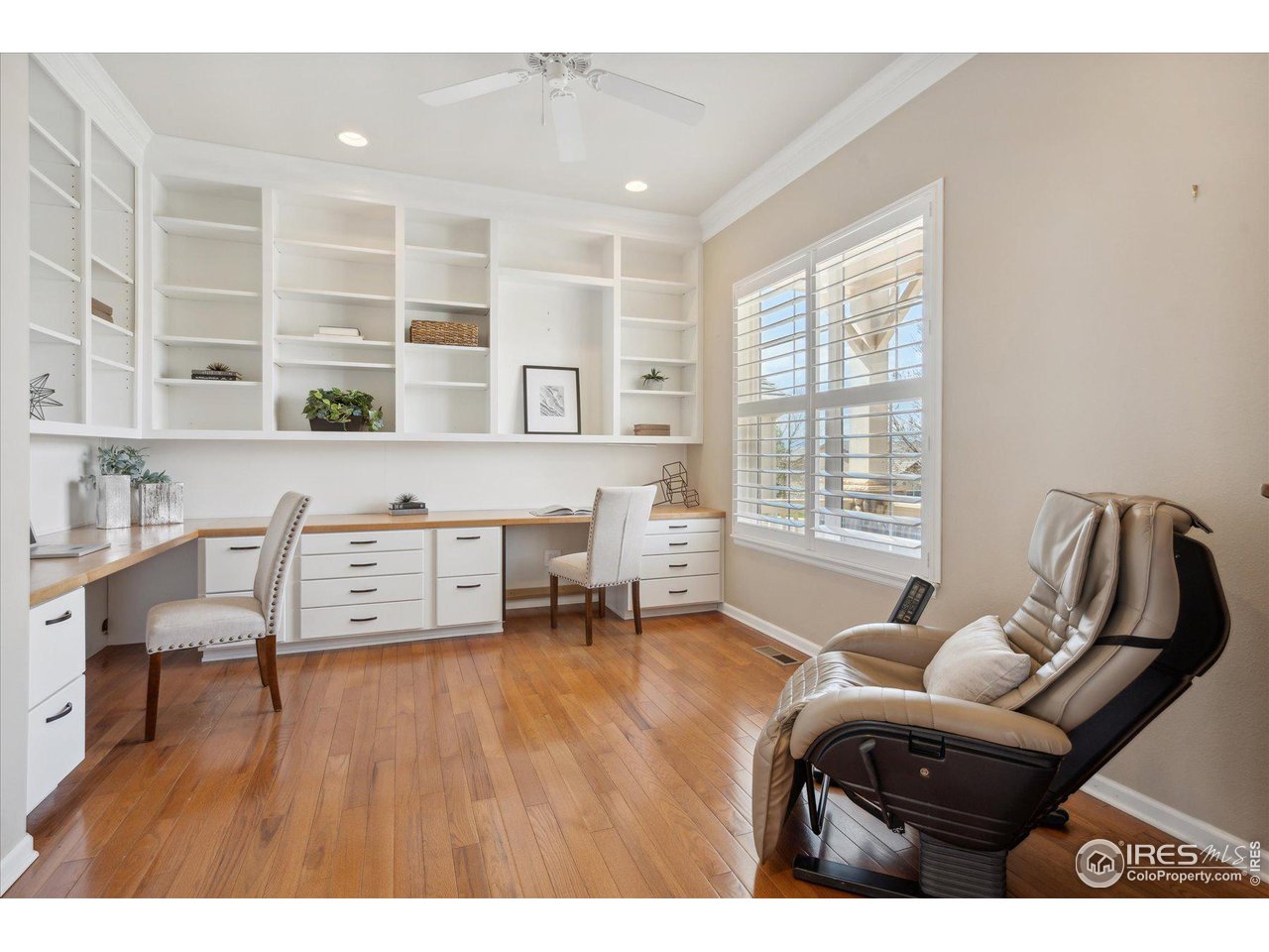 4514 Silver Mountain Loop Broomfield, CO 80023 - Photo 19 of 39 a living room with furniture and large windows