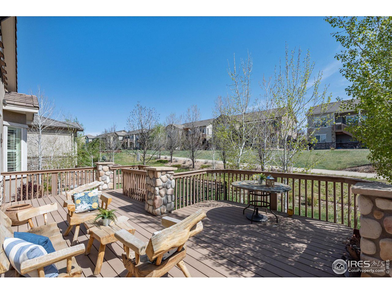 4514 Silver Mountain Loop Broomfield, CO 80023 - Photo 24 of 39 a view of a chairs and table on the terrace