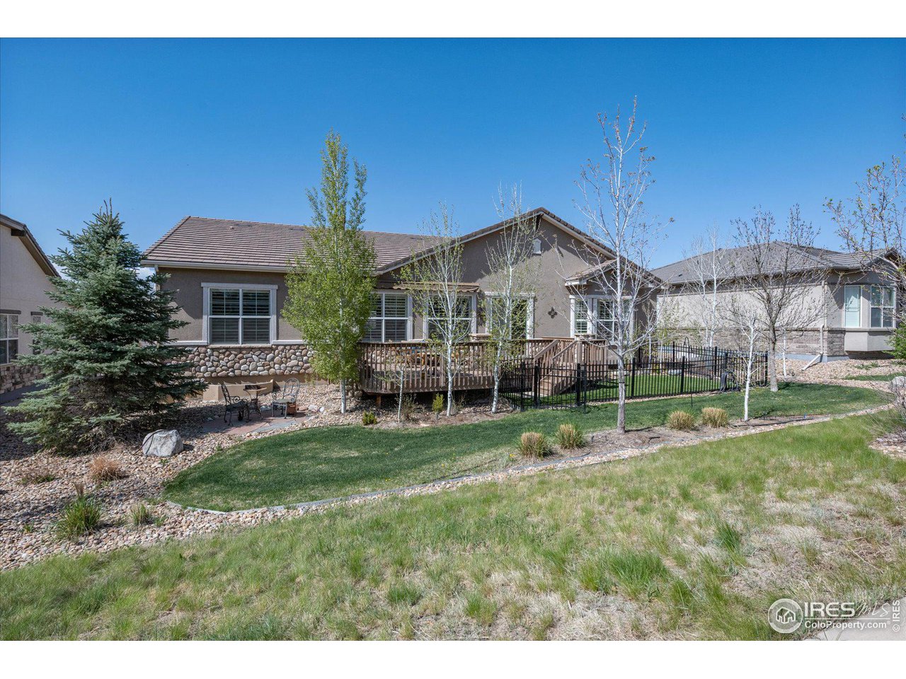 4514 Silver Mountain Loop Broomfield, CO 80023 - Photo 30 of 39 a view of house with a backyard