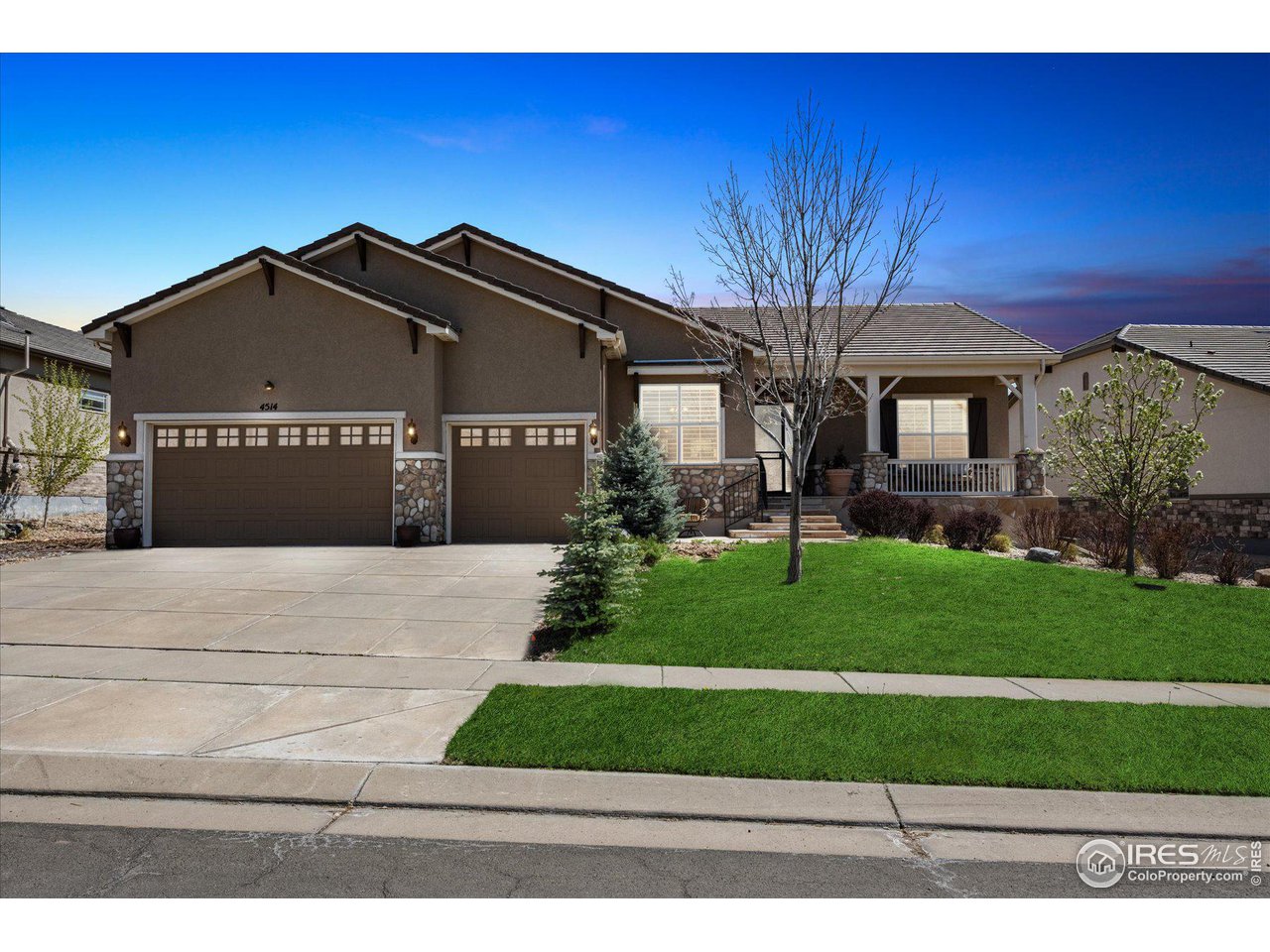 4514 Silver Mountain Loop Broomfield, CO 80023 - Photo 32 of 39 a front view of house with a garden