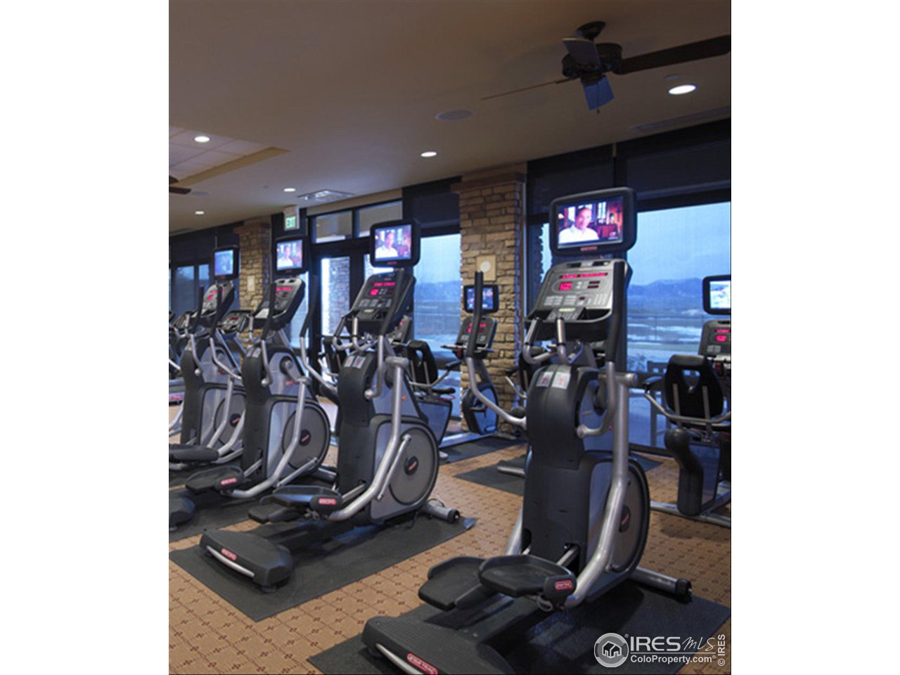 4514 Silver Mountain Loop Broomfield, CO 80023 - Photo 34 of 39 a view of a room with gym equipment
