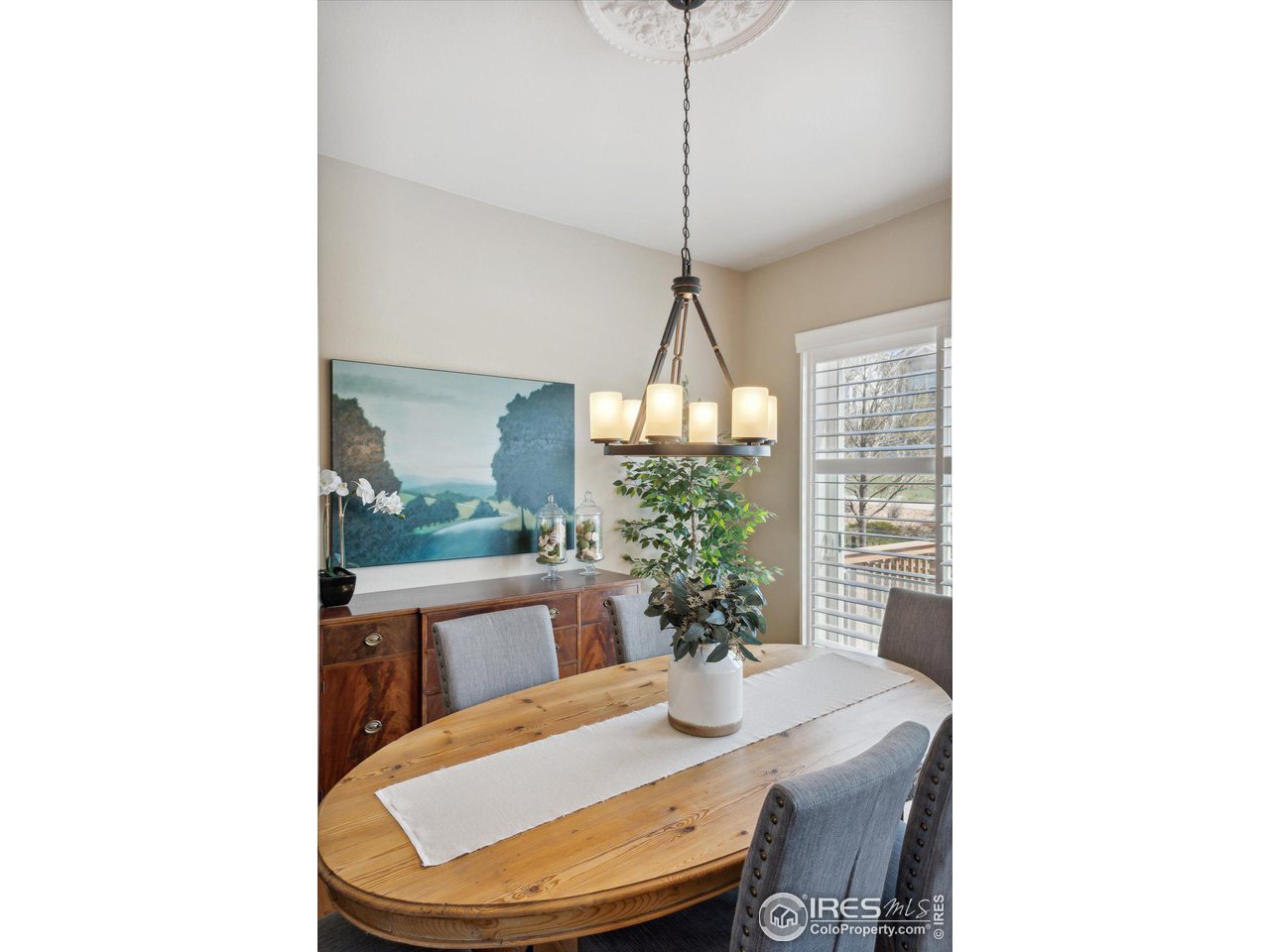 4514 Silver Mountain Loop Broomfield, CO 80023 - Photo 7 of 39 a dining room with furniture and window