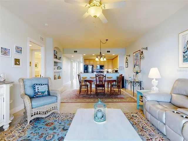 a bedroom with a large bed and a tv