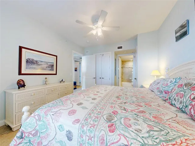 a view of a balcony with a table and chairs