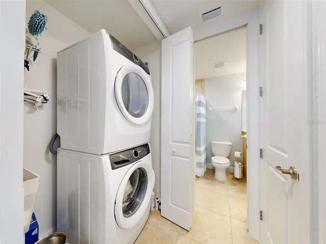 a room with gym equipment and windows