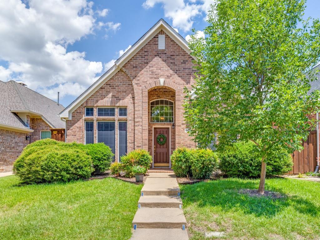 View of front of house featuring brick siding