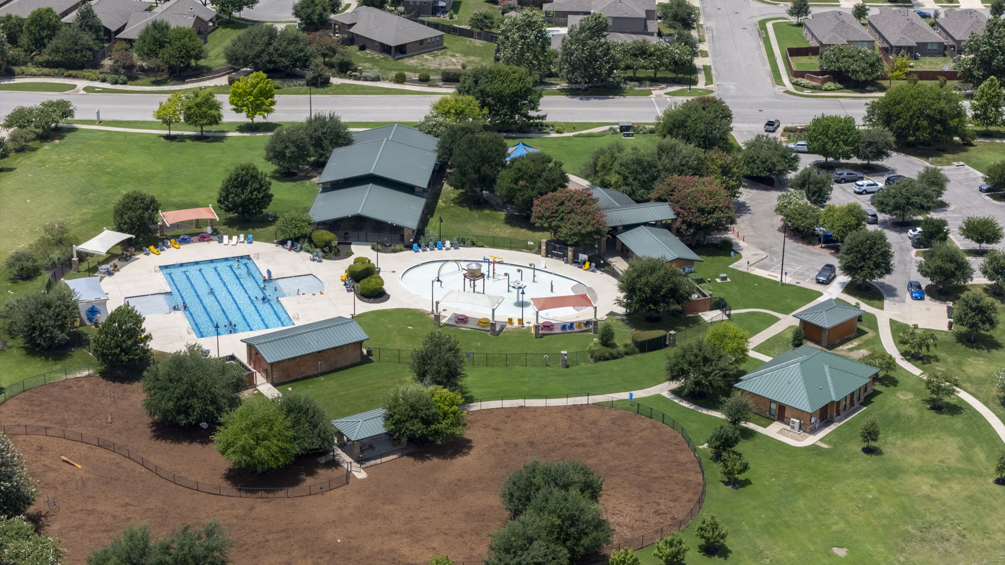 373 Rough Bark Street Buda, TX 78610 - Photo 29 of 39 Aerial view of neighborhood pool within walking distance of home