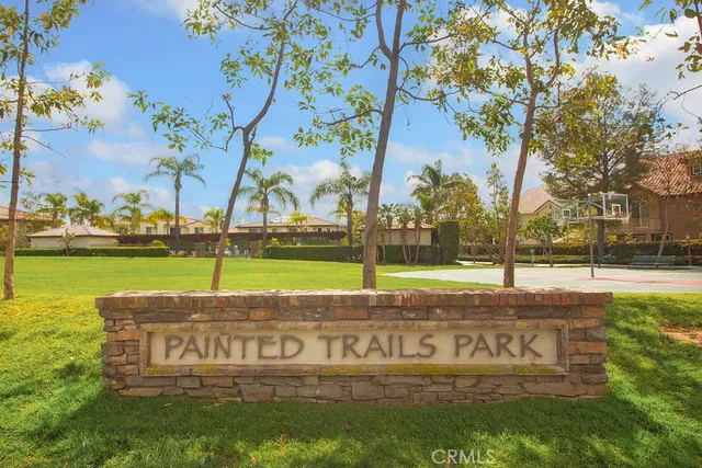 a view of a park with swings and slides