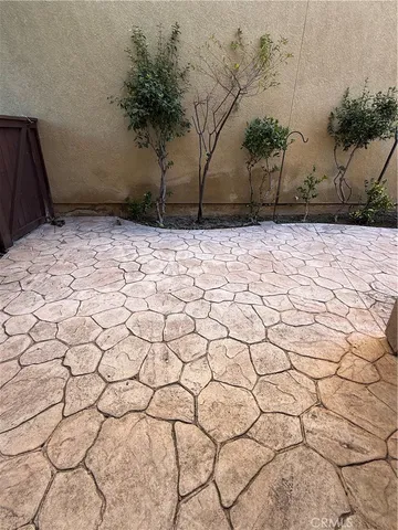a view of wooden fence and trees