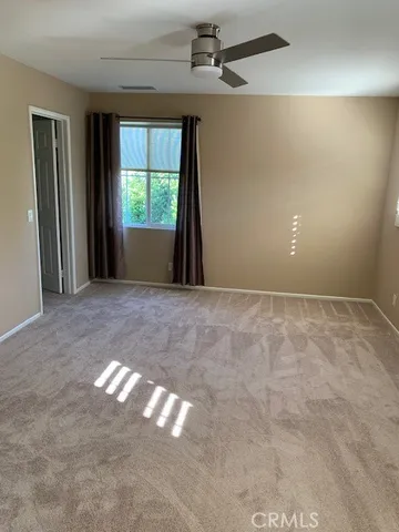 en empty room with windows