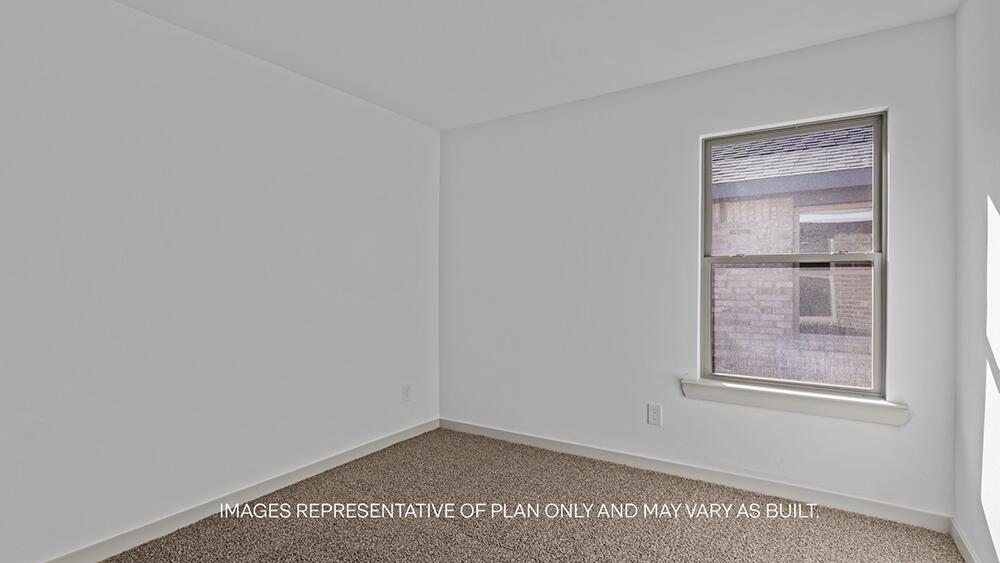 7448 9th Street Lubbock, TX 79416 - Photo 14 of 21 a view of an empty room and window