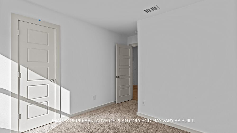 7448 9th Street Lubbock, TX 79416 - Photo 15 of 21 a view of an entryway with wooden floor