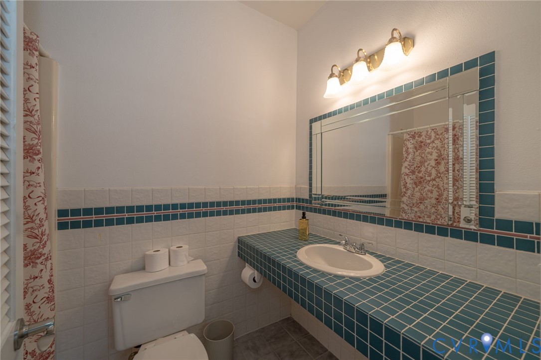 12700 Coalboro Road Chesterfield, VA 23838 - Photo 28 of 50 Bathroom featuring a tiled vanity with integrated