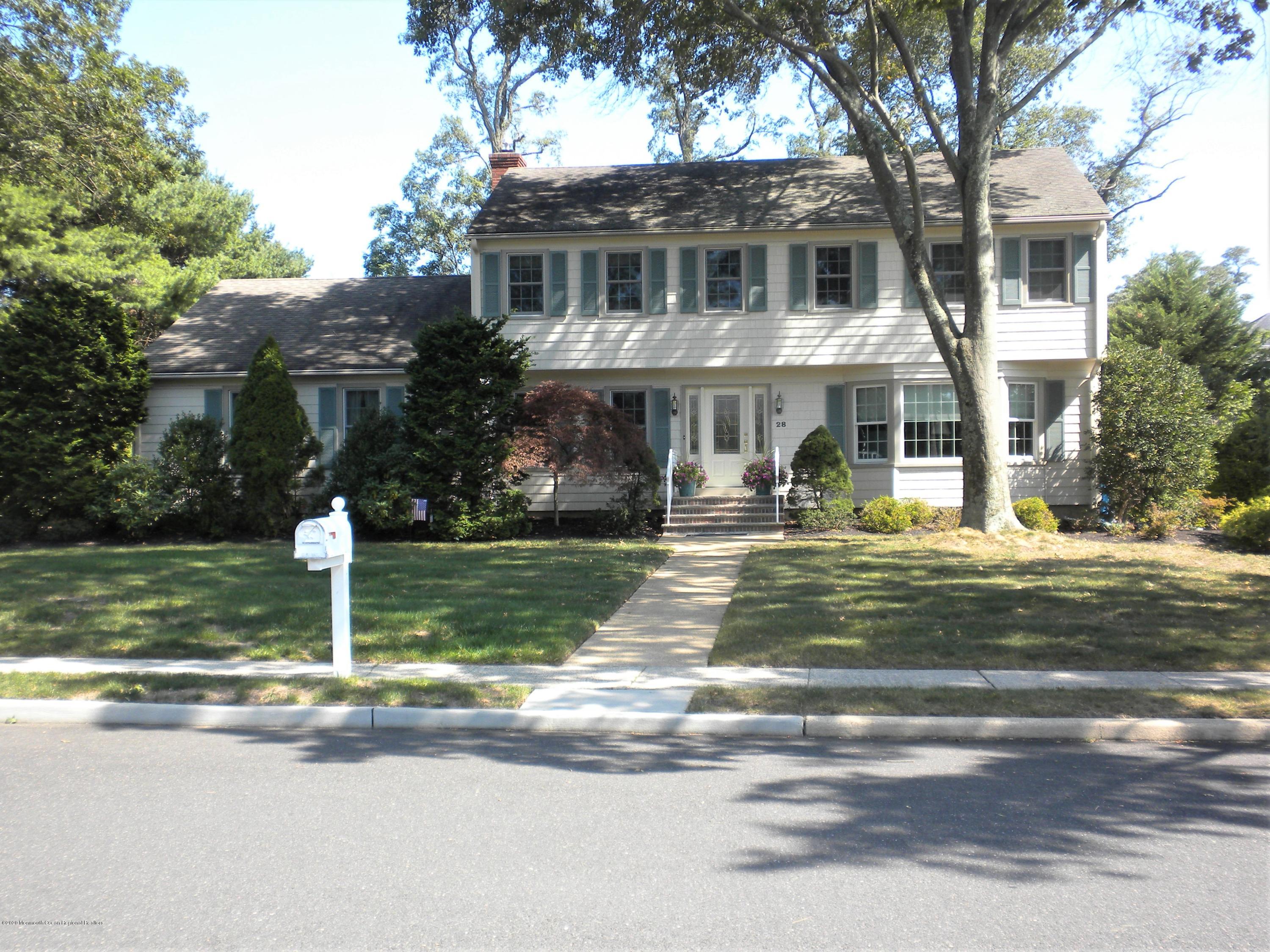 28 Ridge Road West Long Branch, NJ 07764 - Photo 1 of 19 a front view of a house with a yard