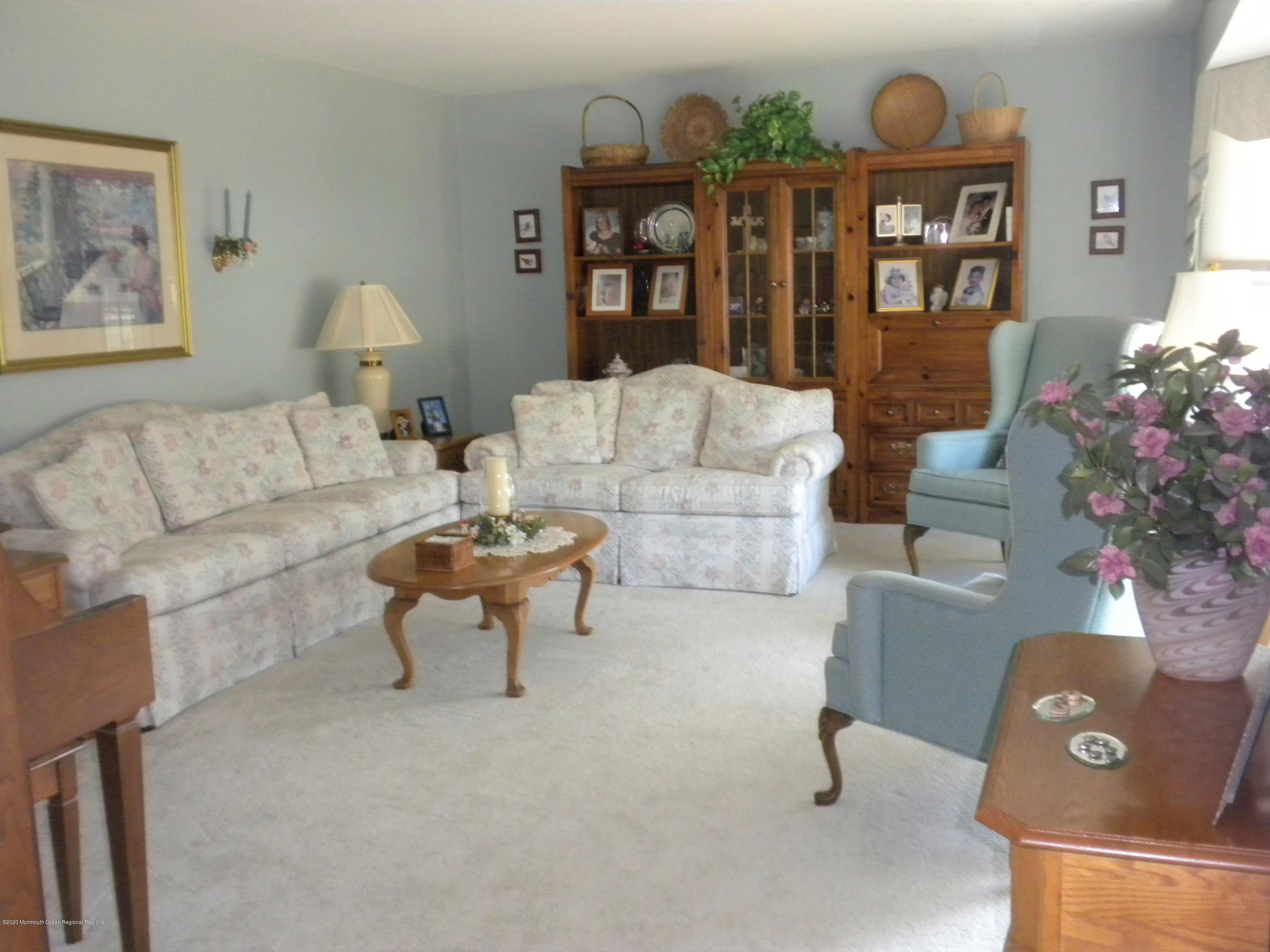 28 Ridge Road West Long Branch, NJ 07764 - Photo 2 of 19 a living room with furniture and wooden floor