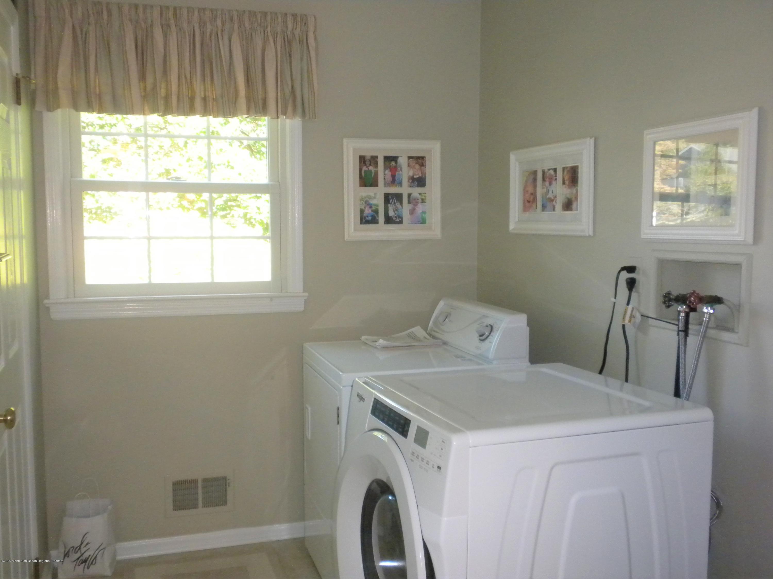 28 Ridge Road West Long Branch, NJ 07764 - Photo 19 of 19 a utility room with dryer and washer