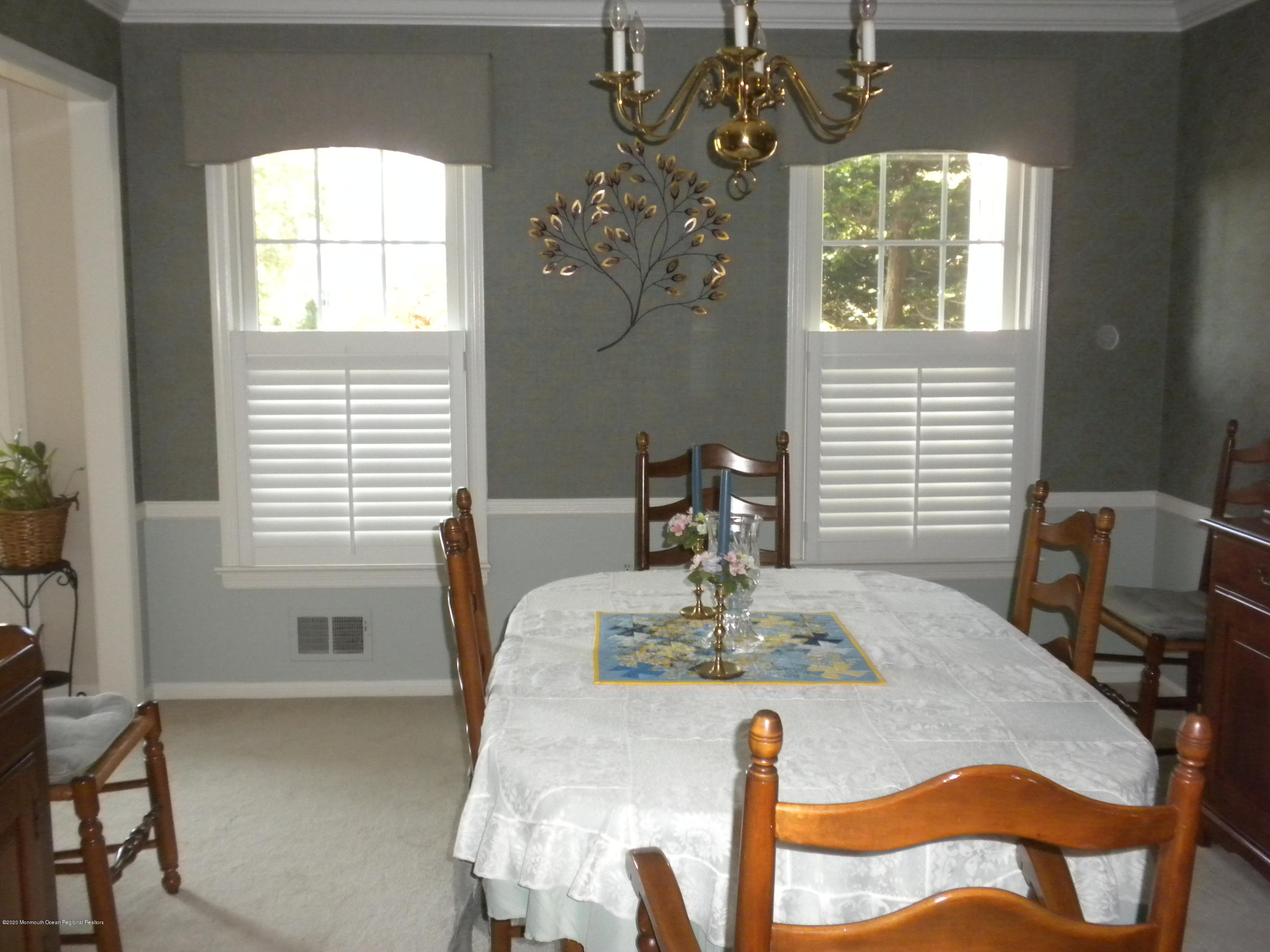28 Ridge Road West Long Branch, NJ 07764 - Photo 3 of 19 a view of a dining room with furniture and window