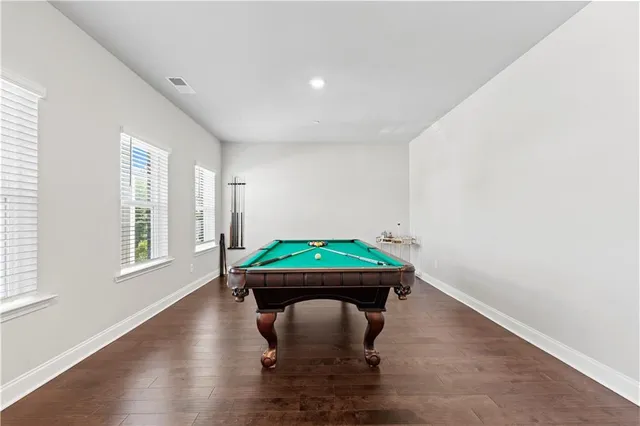 a room with window and wooden floor