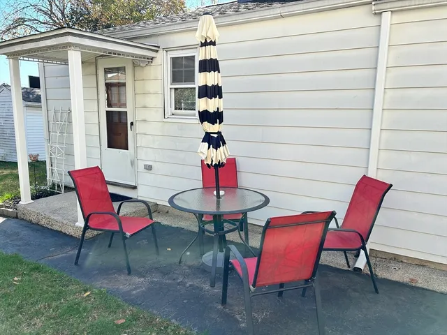 a view of a chairs with a table