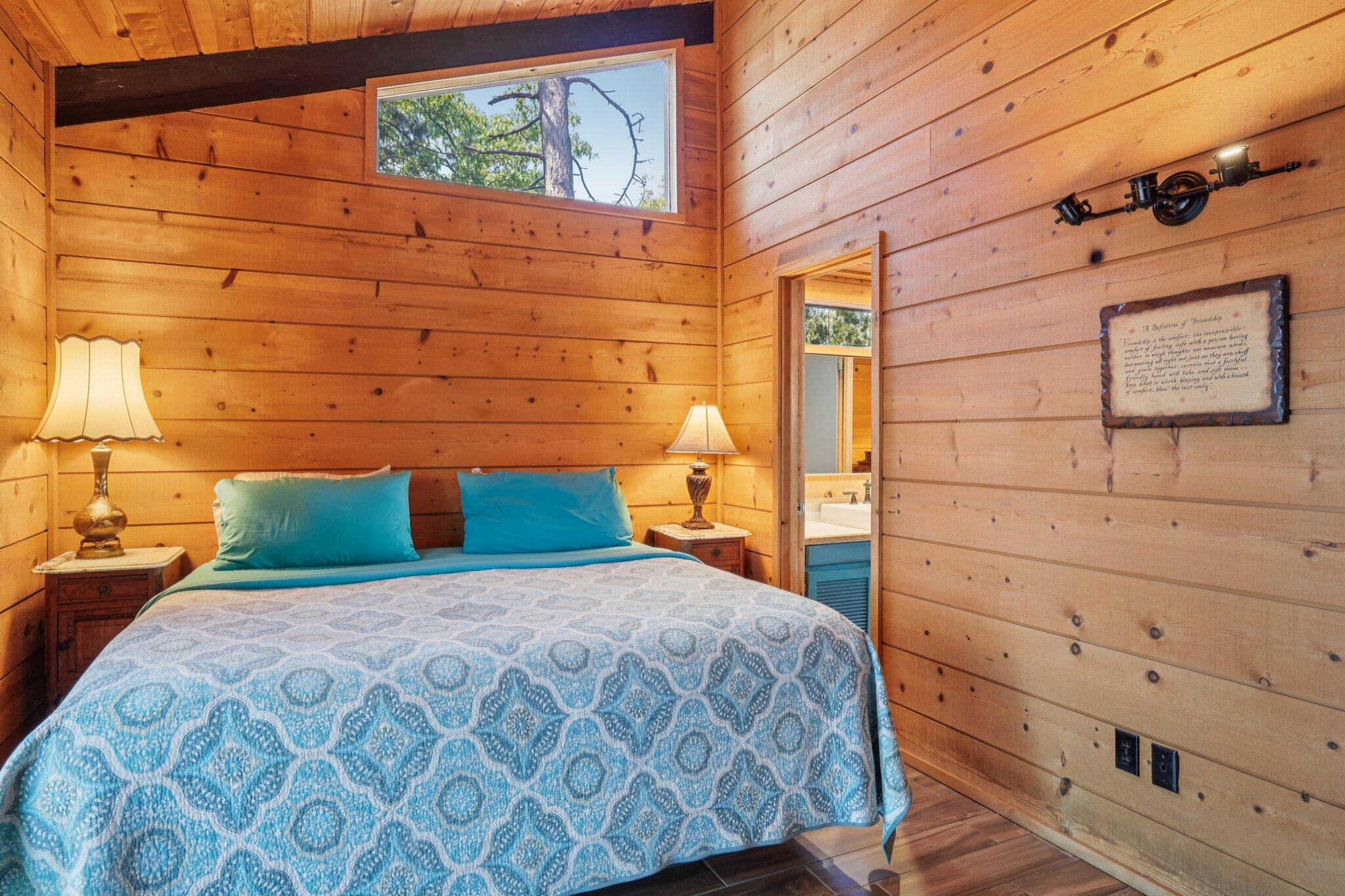 24800 Marion Ridge Drive Idyllwild, CA 92549 - Photo 20 of 39 a bedroom with a bed and a window
