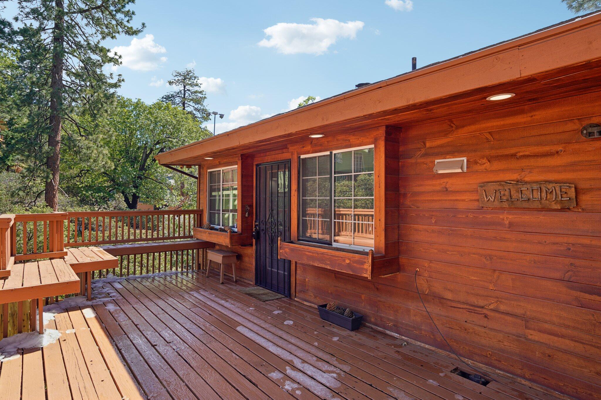 24800 Marion Ridge Drive Idyllwild, CA 92549 - Photo 2 of 39 a view of a house with a deck