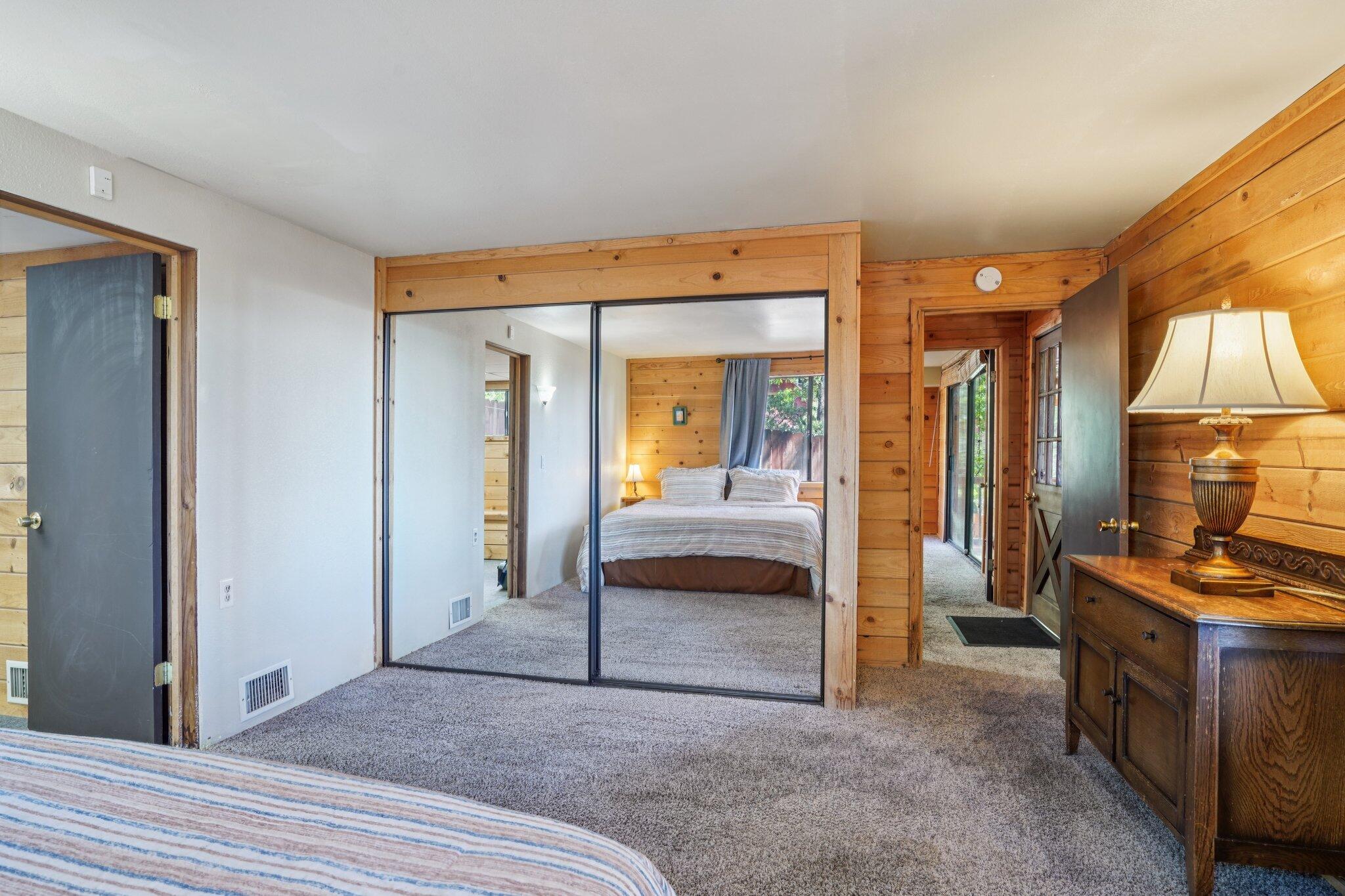 24800 Marion Ridge Drive Idyllwild, CA 92549 - Photo 25 of 39 a view of a bedroom with a bed and gym equipment